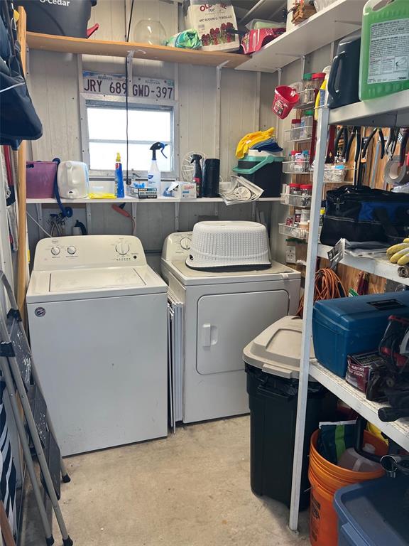 44 Thatch Palm Street West Largo, FL 33770 - Photo 25 of 25 a utility room with dryer and washer
