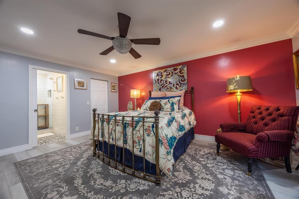 201 Southwest 1st Street, Unit 10 Boca Raton, FL 33432 - Photo 15 of 28 a bed room with a bed and a couch