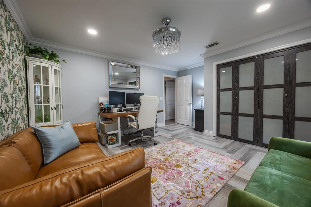 201 Southwest 1st Street, Unit 10 Boca Raton, FL 33432 - Photo 23 of 28 a living room with furniture and a rug