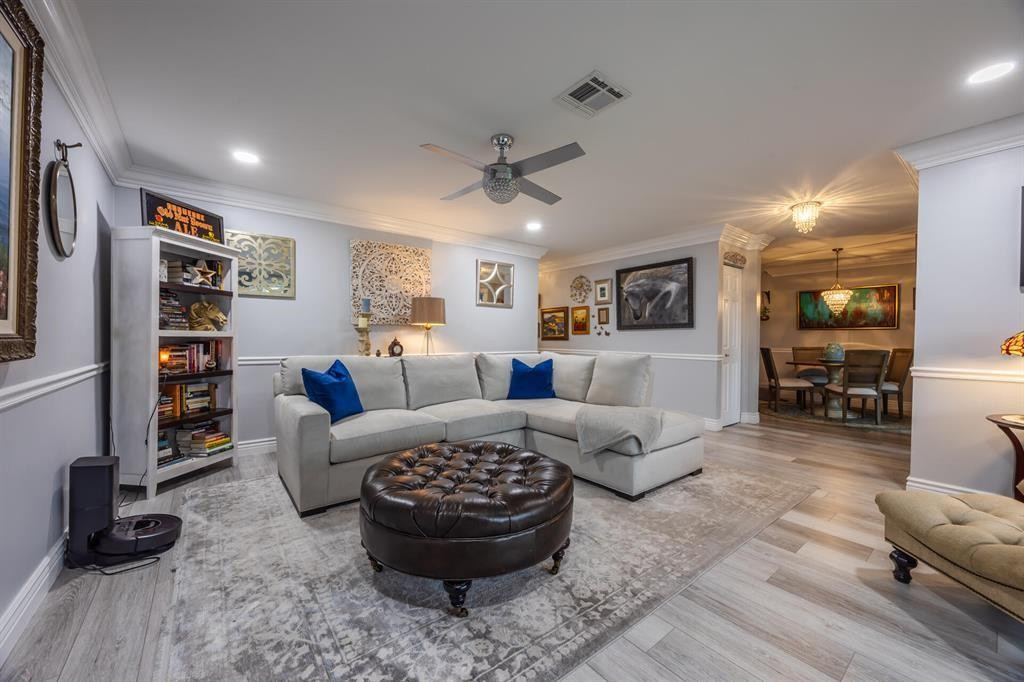201 Southwest 1st Street, Unit 10 Boca Raton, FL 33432 - Photo 5 of 28 a living room with furniture and a rug
