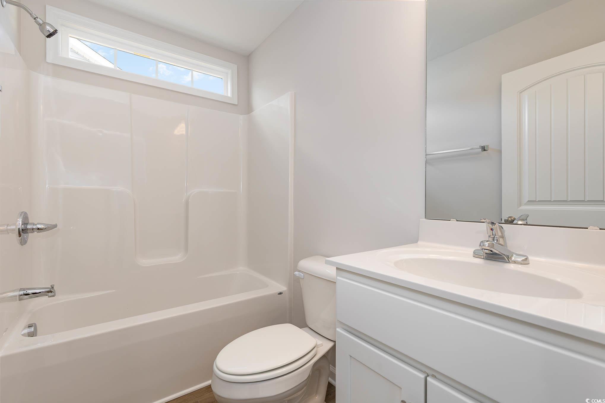 355 5th Avenue Aynor, SC 29511 - Photo 13 of 15 Full bath with shower / washtub combination and vanity