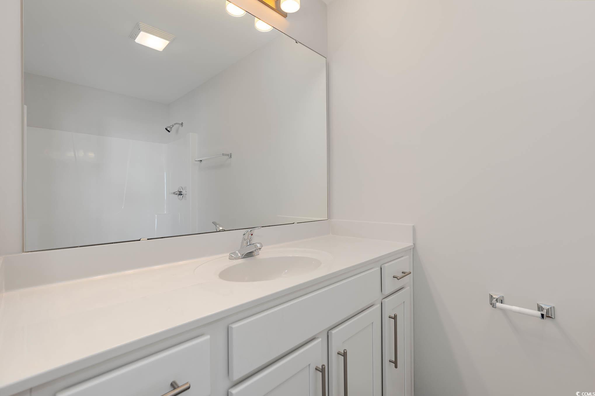 355 5th Avenue Aynor, SC 29511 - Photo 10 of 15 Full bath with vanity and a shower
