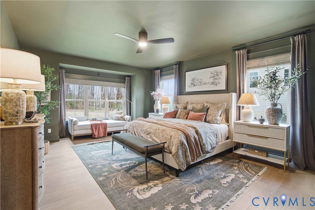 4023 Tuckmar Ridge Drive Moseley, VA 23120 - Photo 11 of 21 a bedroom with a bed and a large window