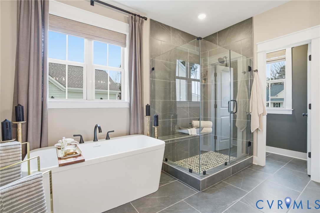 4023 Tuckmar Ridge Drive Moseley, VA 23120 - Photo 12 of 21 a bathroom with a tub shower and sink