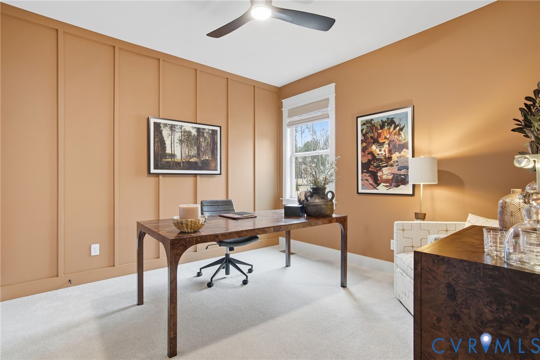4023 Tuckmar Ridge Drive Moseley, VA 23120 - Photo 18 of 21 a view of a livingroom with workspace and a couch
