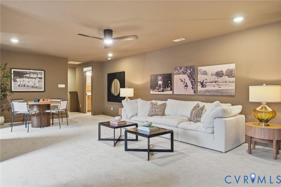 4023 Tuckmar Ridge Drive Moseley, VA 23120 - Photo 19 of 21 a living room with furniture and a table