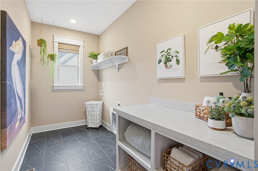 4023 Tuckmar Ridge Drive Moseley, VA 23120 - Photo 21 of 21 a hallway with a wooden floor and a potted plant