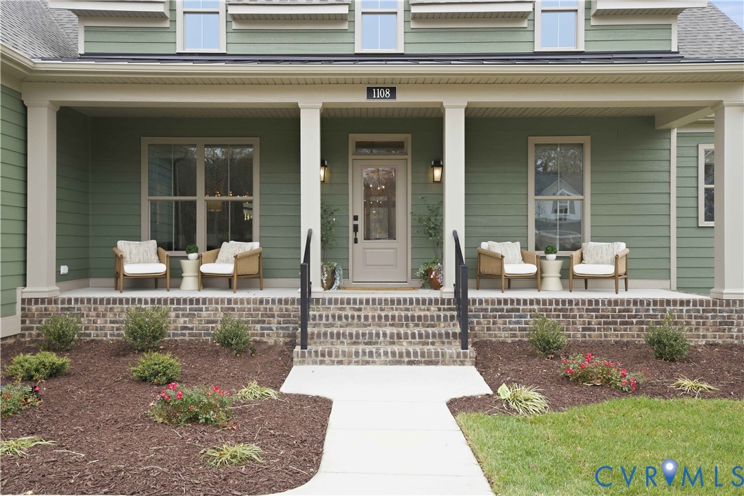 4023 Tuckmar Ridge Drive Moseley, VA 23120 - Photo 5 of 21 front view of a house with a porch