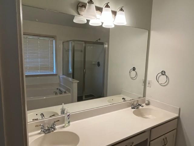 2945 Highland Pass Alpharetta, GA 30004 - Photo 19 of 29 a bathroom with a sink and a mirror