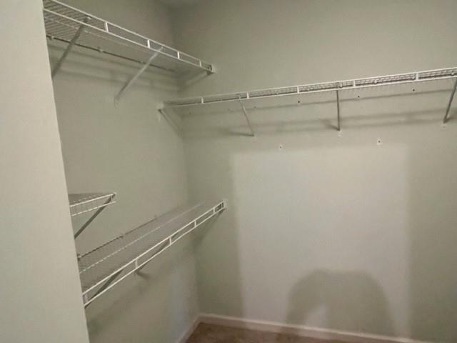 2945 Highland Pass Alpharetta, GA 30004 - Photo 20 of 29 a view of a room with racks on the wall