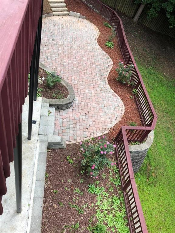 2945 Highland Pass Alpharetta, GA 30004 - Photo 24 of 29 a balcony with chairs and a rug