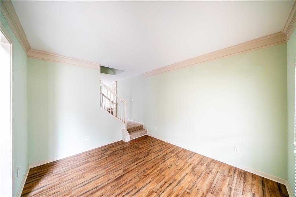 2945 Highland Pass Alpharetta, GA 30004 - Photo 4 of 29 a view of empty room with wooden floor