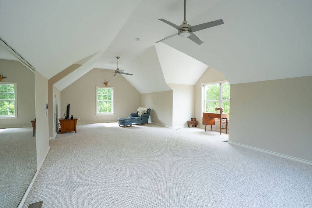 13800 Lone Rider Trail Austin, TX 78738 - Photo 15 of 27 a view of a livingroom with a window and a chandelier