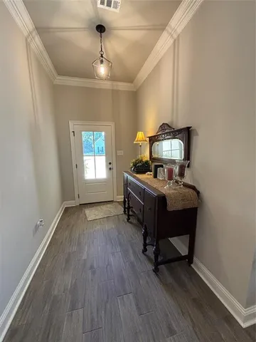 a view of workspace with wooden floor