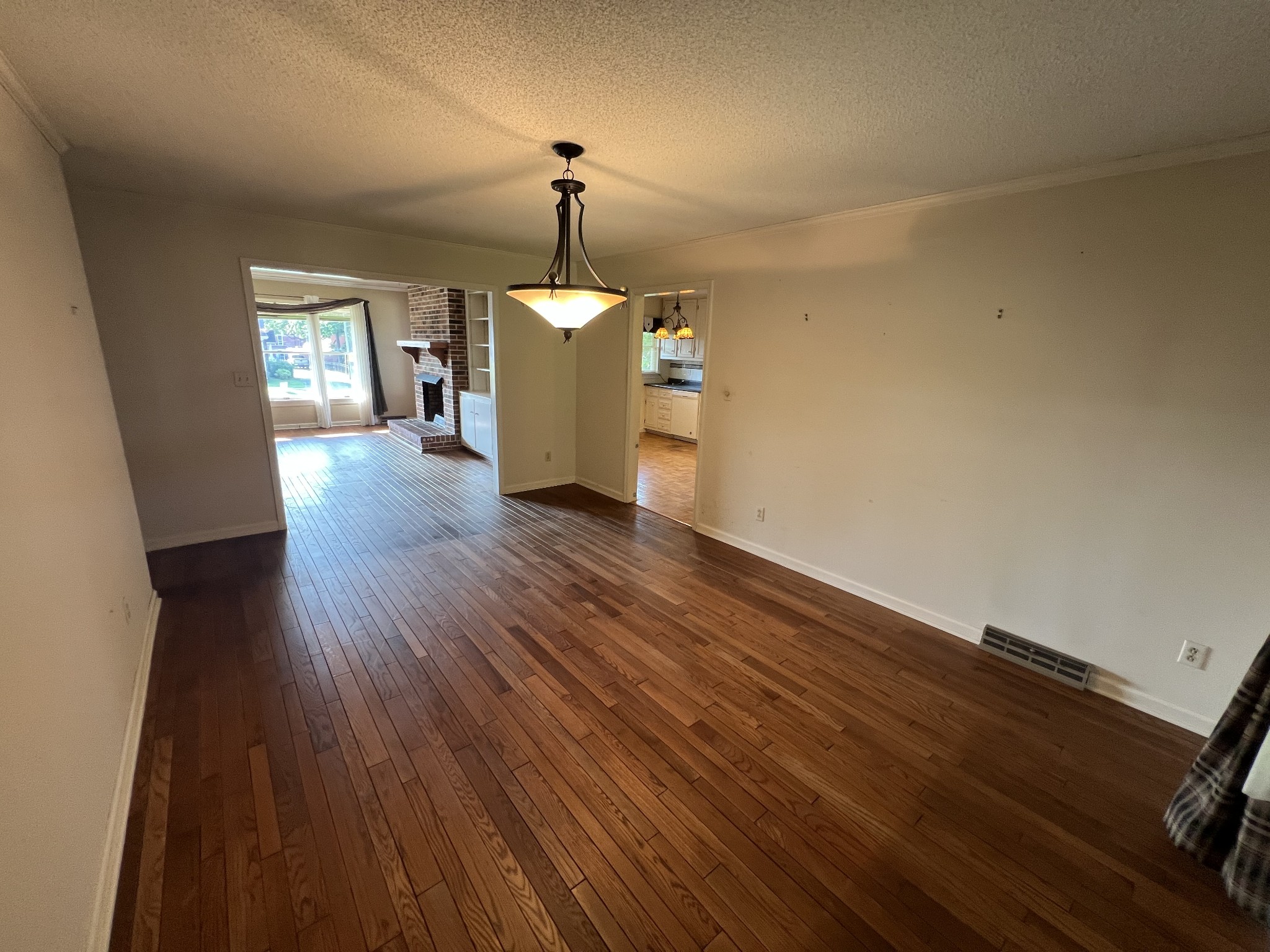 212 North 3rd Street Pulaski, TN 38478 - Photo 11 of 38 a view of empty room with wooden floor