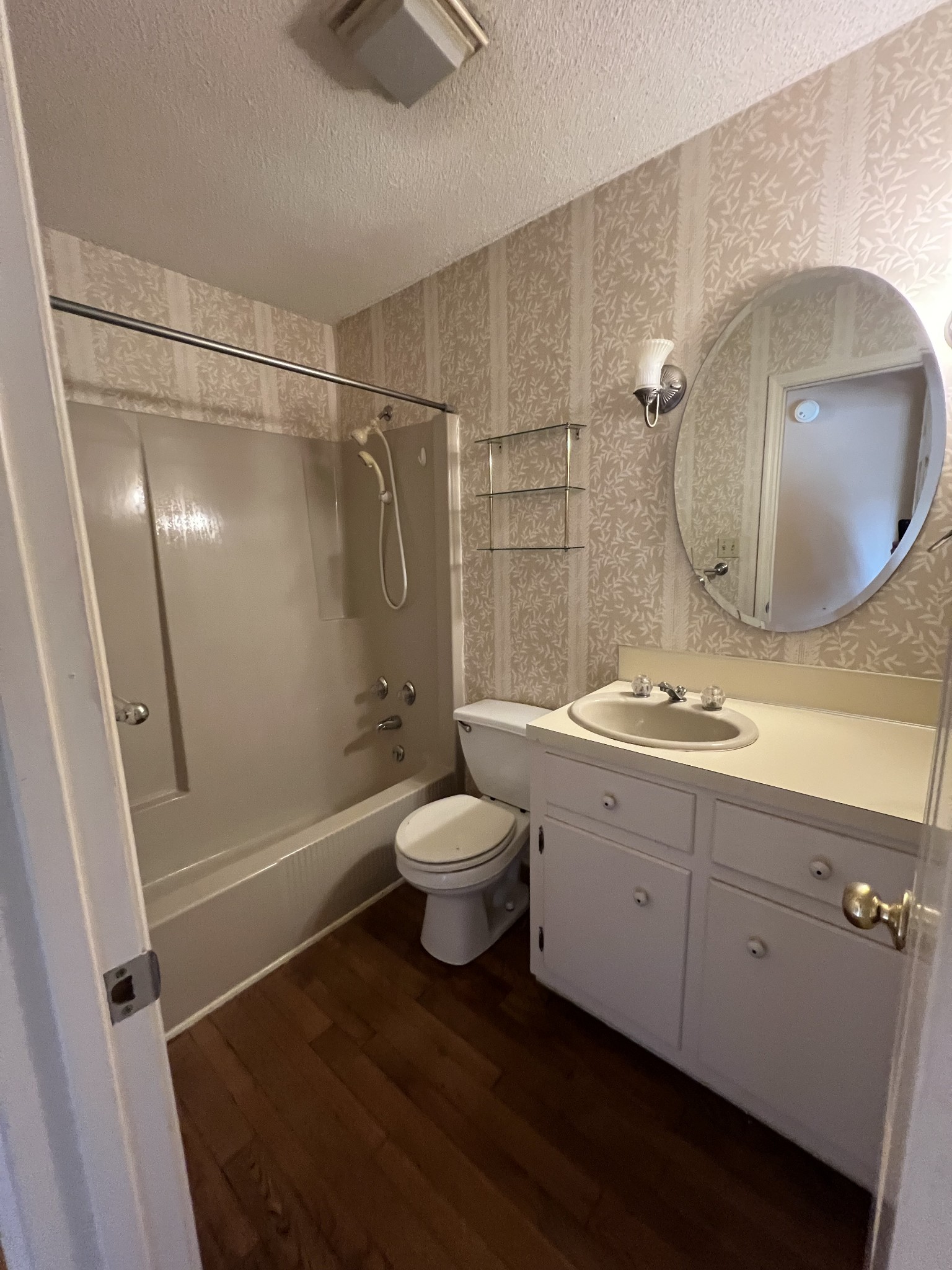 212 North 3rd Street Pulaski, TN 38478 - Photo 20 of 38 a bathroom with a double vanity sink toilet mirror and shower