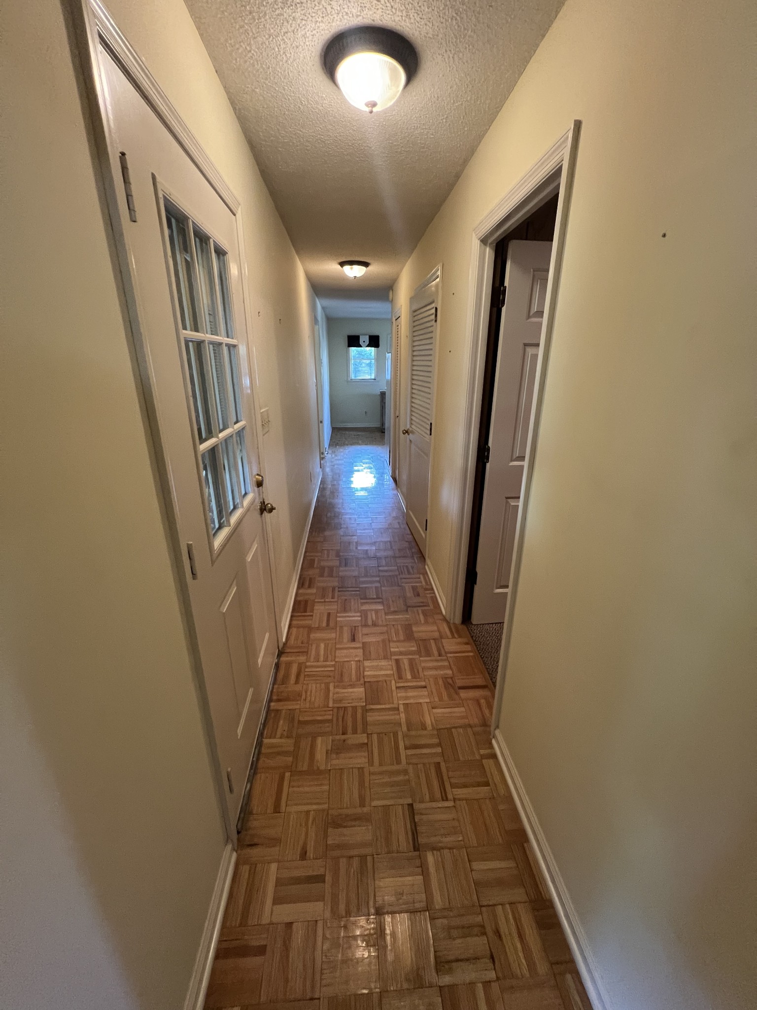 212 North 3rd Street Pulaski, TN 38478 - Photo 23 of 38 a view of a hallway with wooden floor and staircase