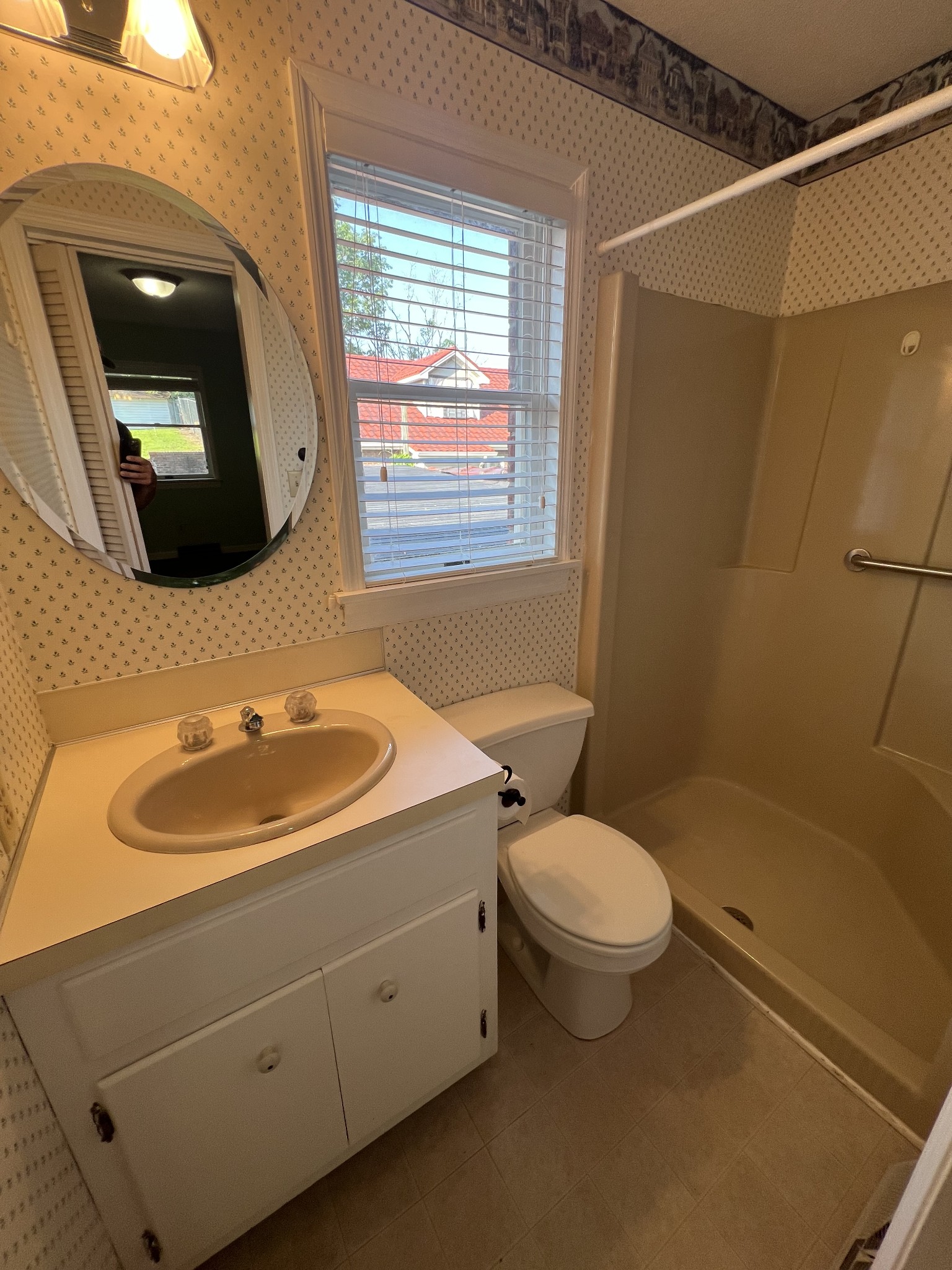 212 North 3rd Street Pulaski, TN 38478 - Photo 29 of 38 a bathroom with a sink toilet and mirror