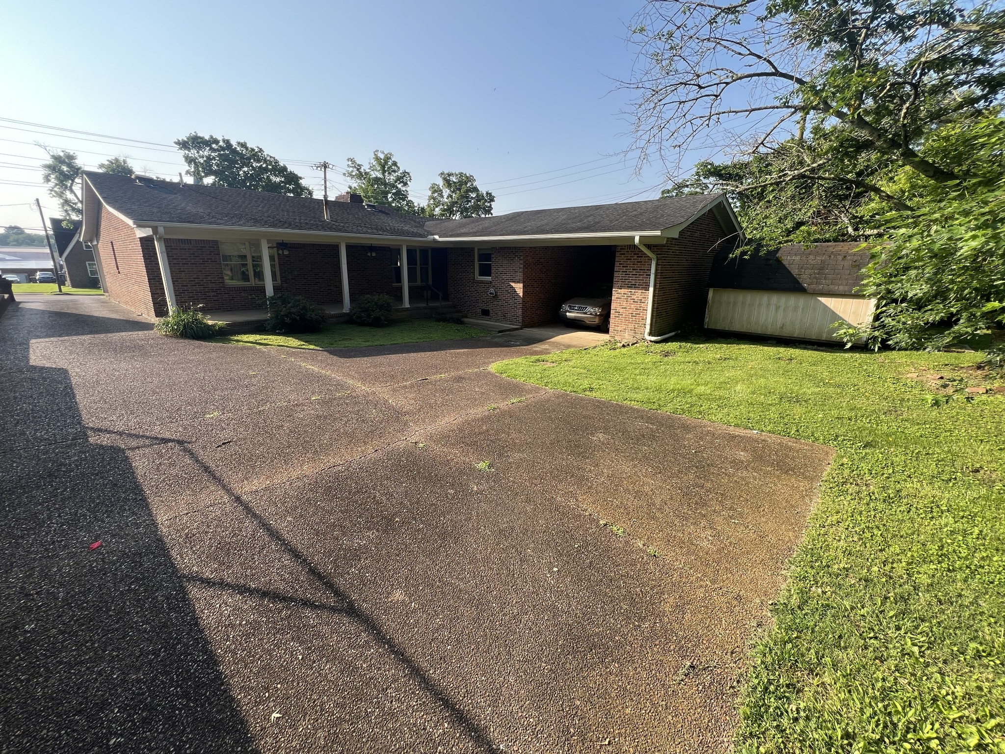 212 North 3rd Street Pulaski, TN 38478 - Photo 38 of 38 front view of a house with a yard and potted plants
