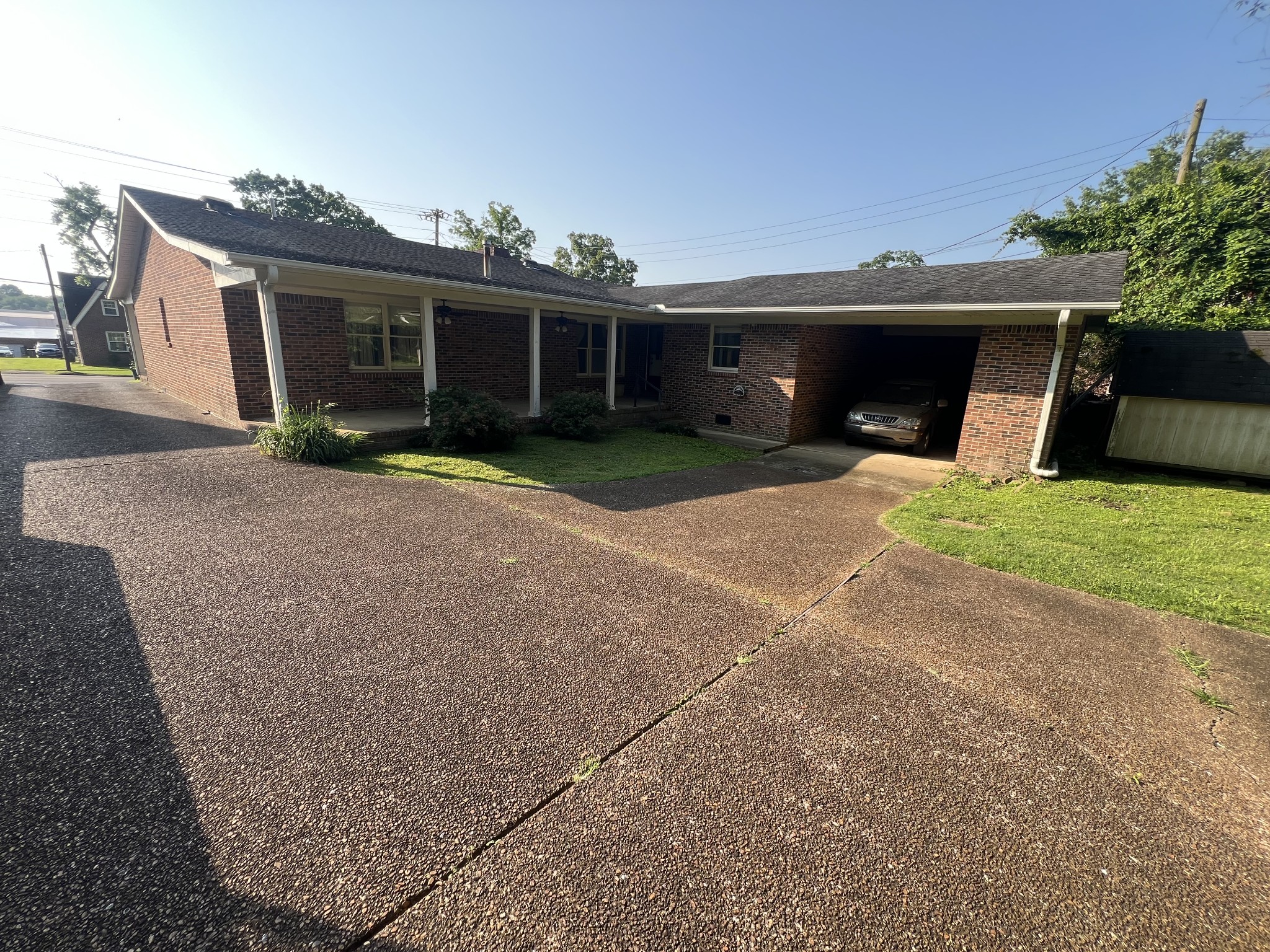 212 North 3rd Street Pulaski, TN 38478 - Photo 4 of 38 a view of a house with a yard and a garage
