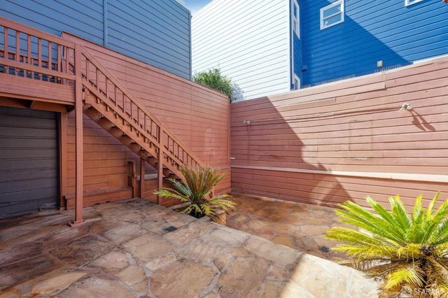 a view of a large trees with a big yard and large trees