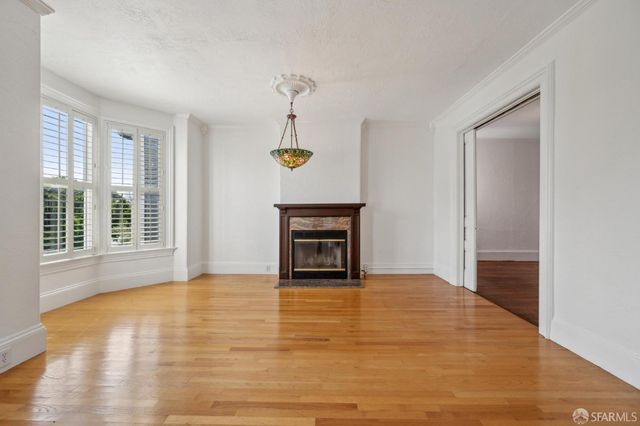 a kitchen with stainless steel appliances a sink stove and refrigerator