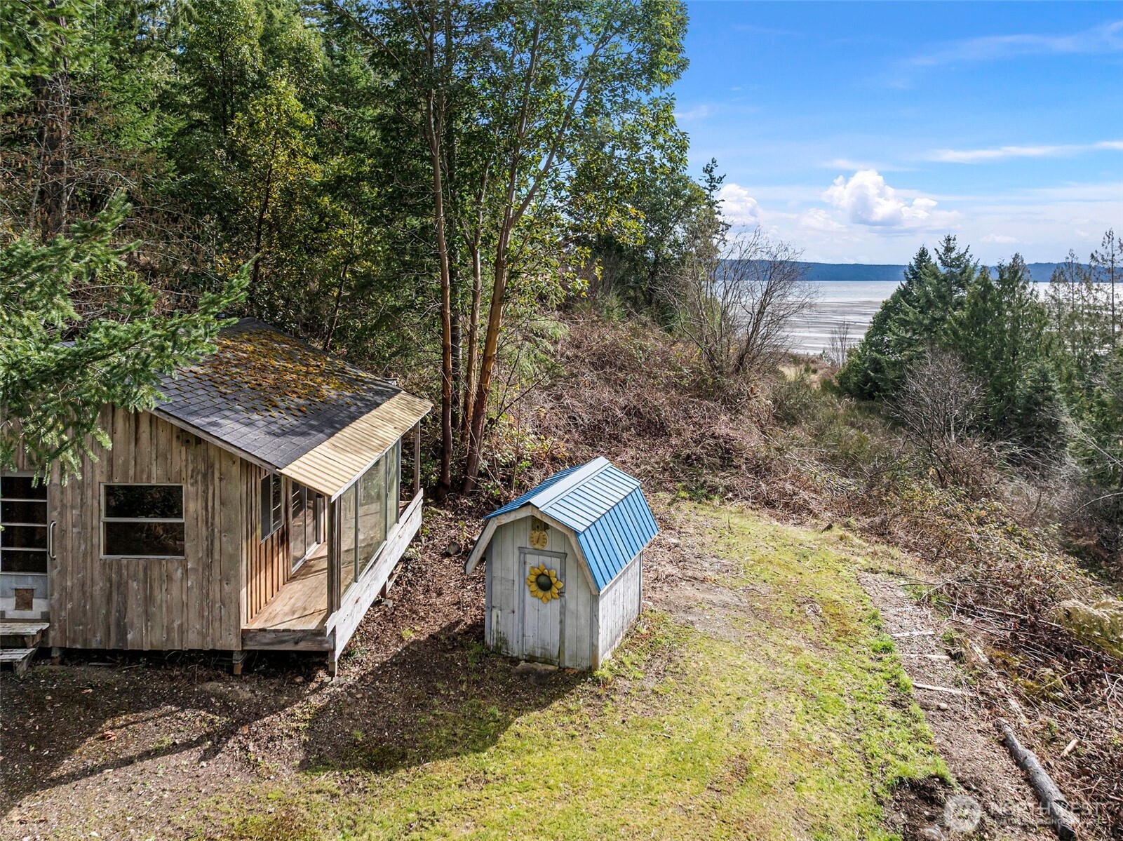 309723 Highway 101 Brinnon, WA 98320 - Photo 11 of 40 a aerial view of a house with a yard