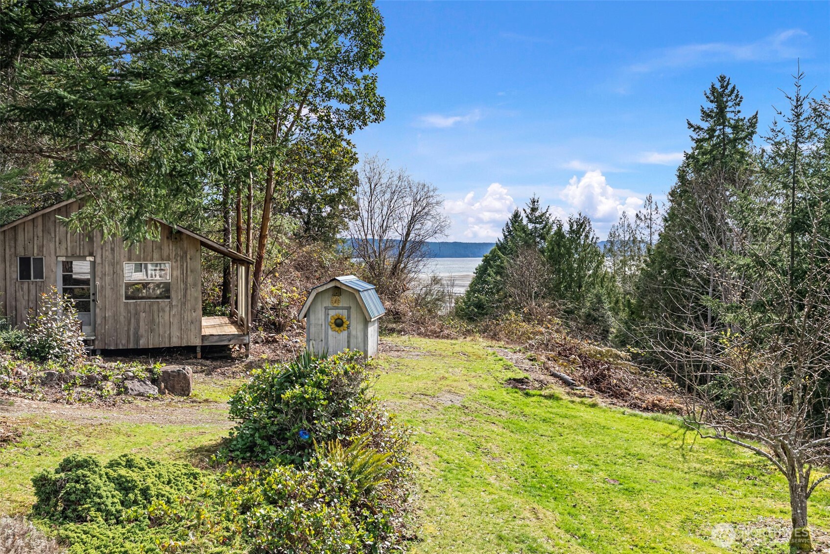 309723 Highway 101 Brinnon, WA 98320 - Photo 12 of 40 a house view with a outdoor space