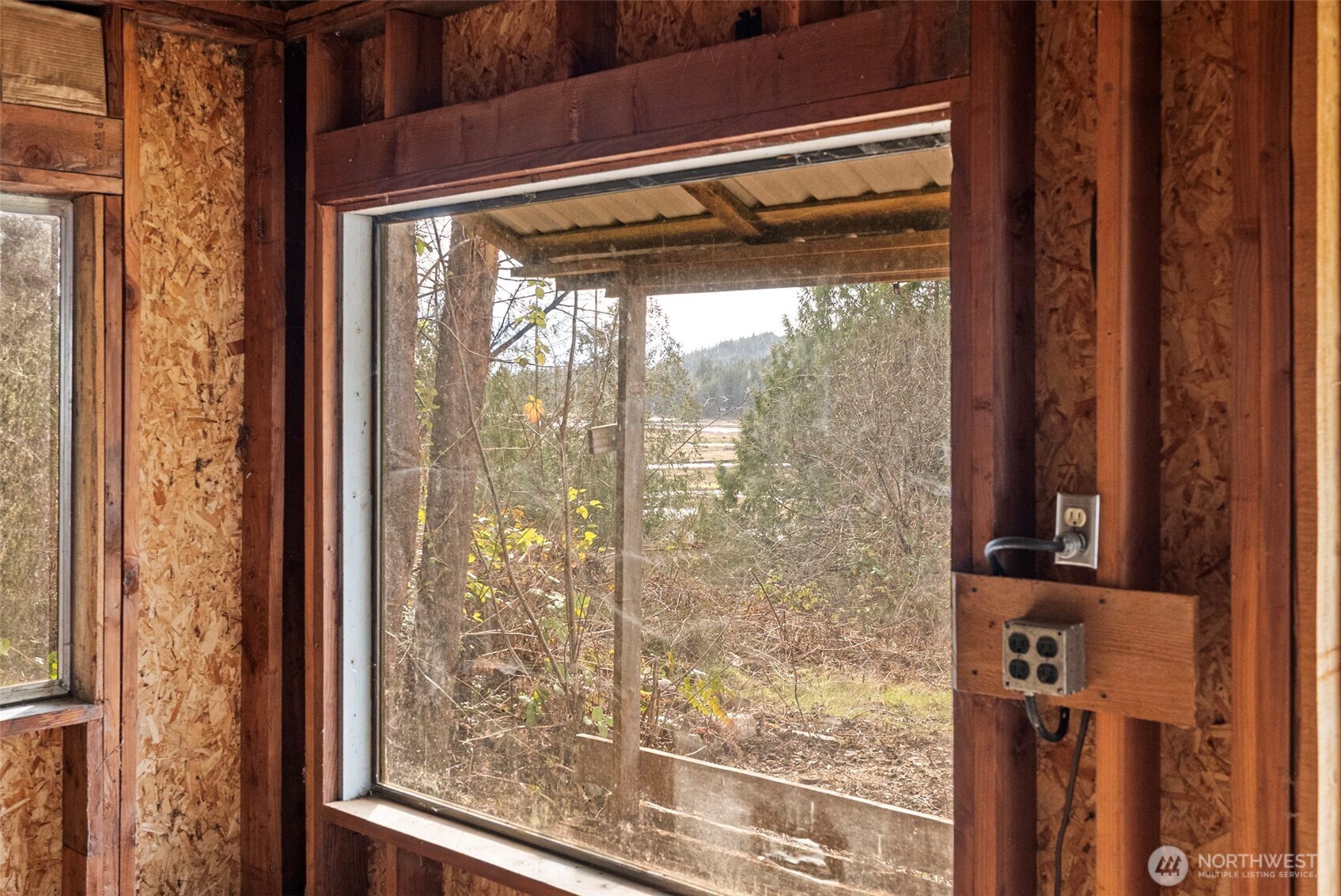 309723 Highway 101 Brinnon, WA 98320 - Photo 14 of 40 a view of a glass door with a glass door