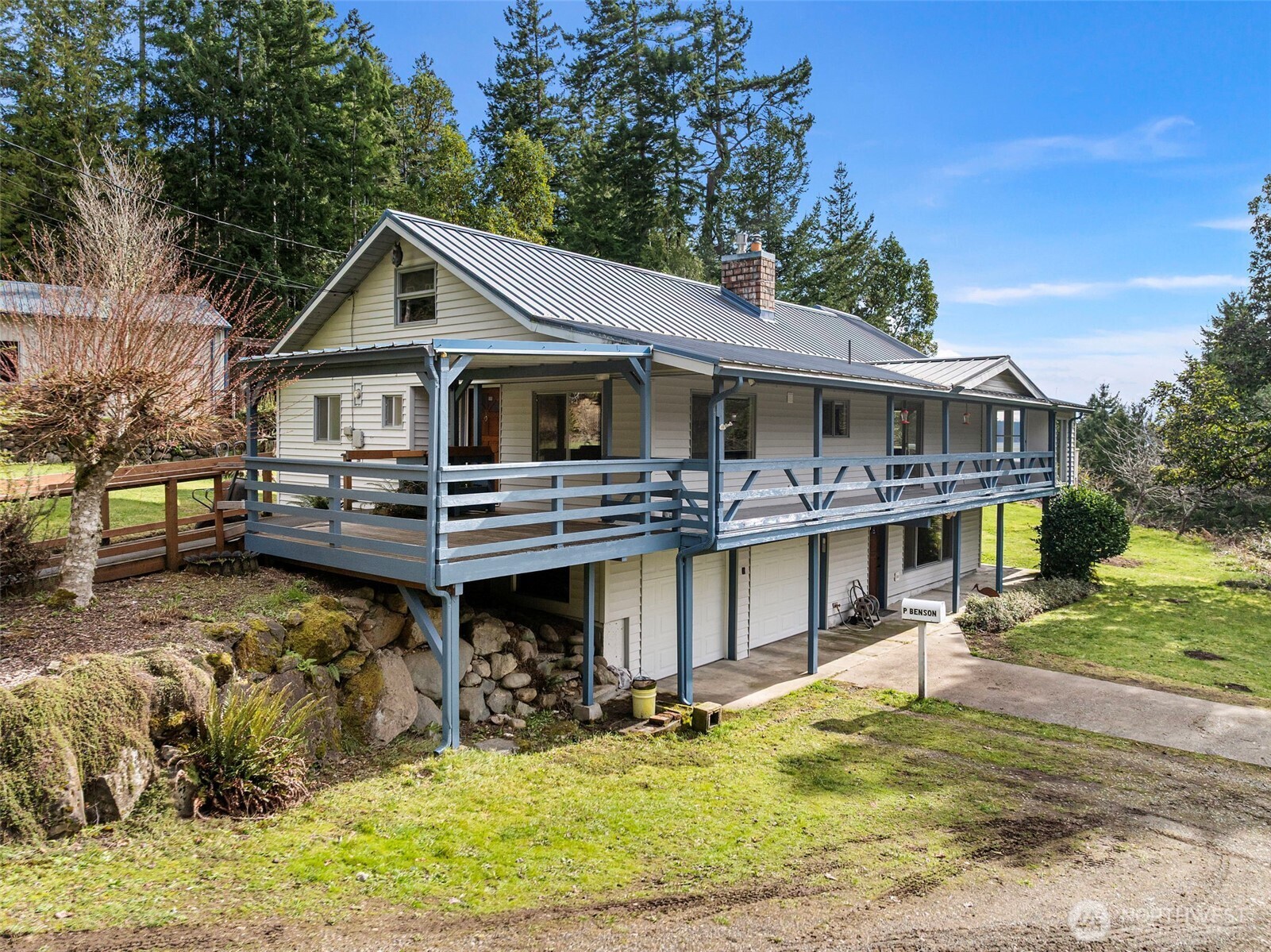 309723 Highway 101 Brinnon, WA 98320 - Photo 17 of 40 a view of house with outdoor seating yard and swimming pool