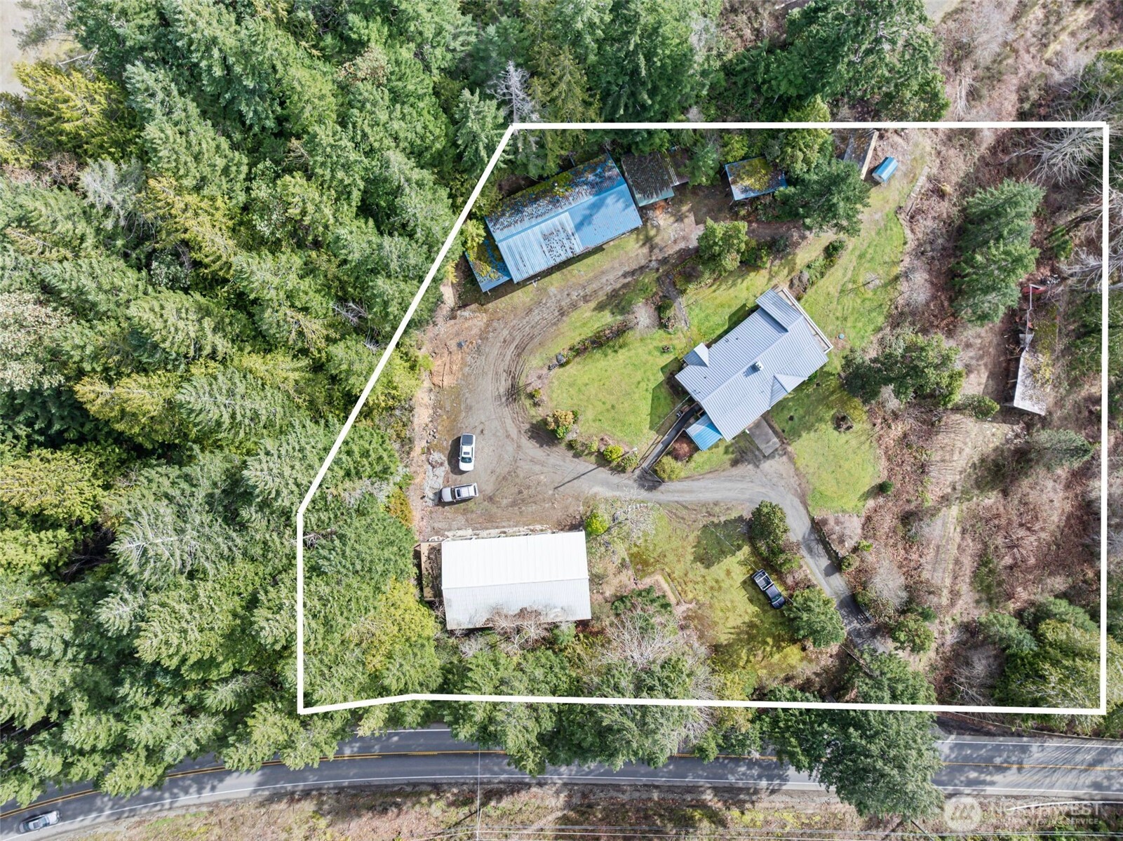 309723 Highway 101 Brinnon, WA 98320 - Photo 2 of 40 an aerial view of a house