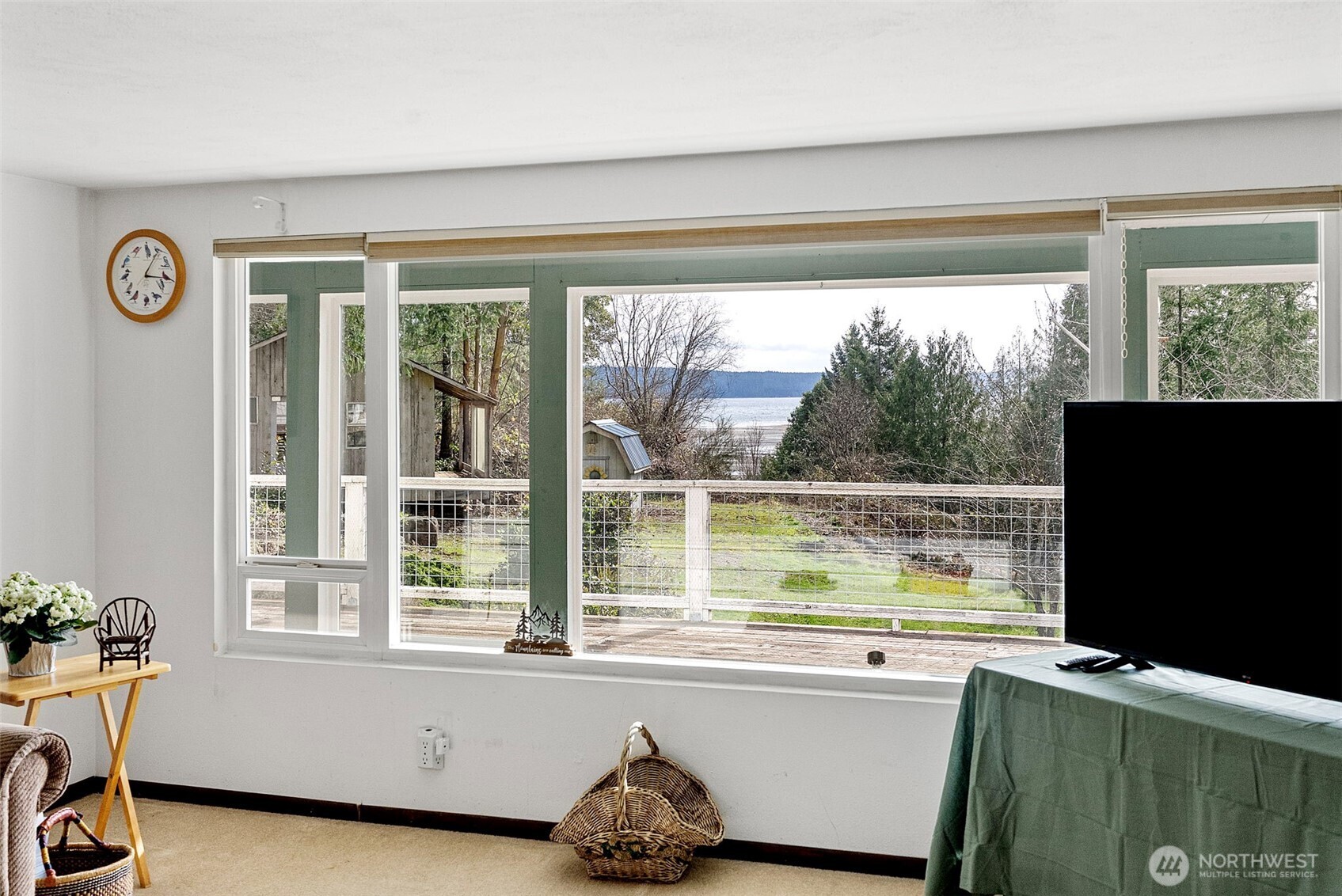 309723 Highway 101 Brinnon, WA 98320 - Photo 27 of 40 a living room with a large window