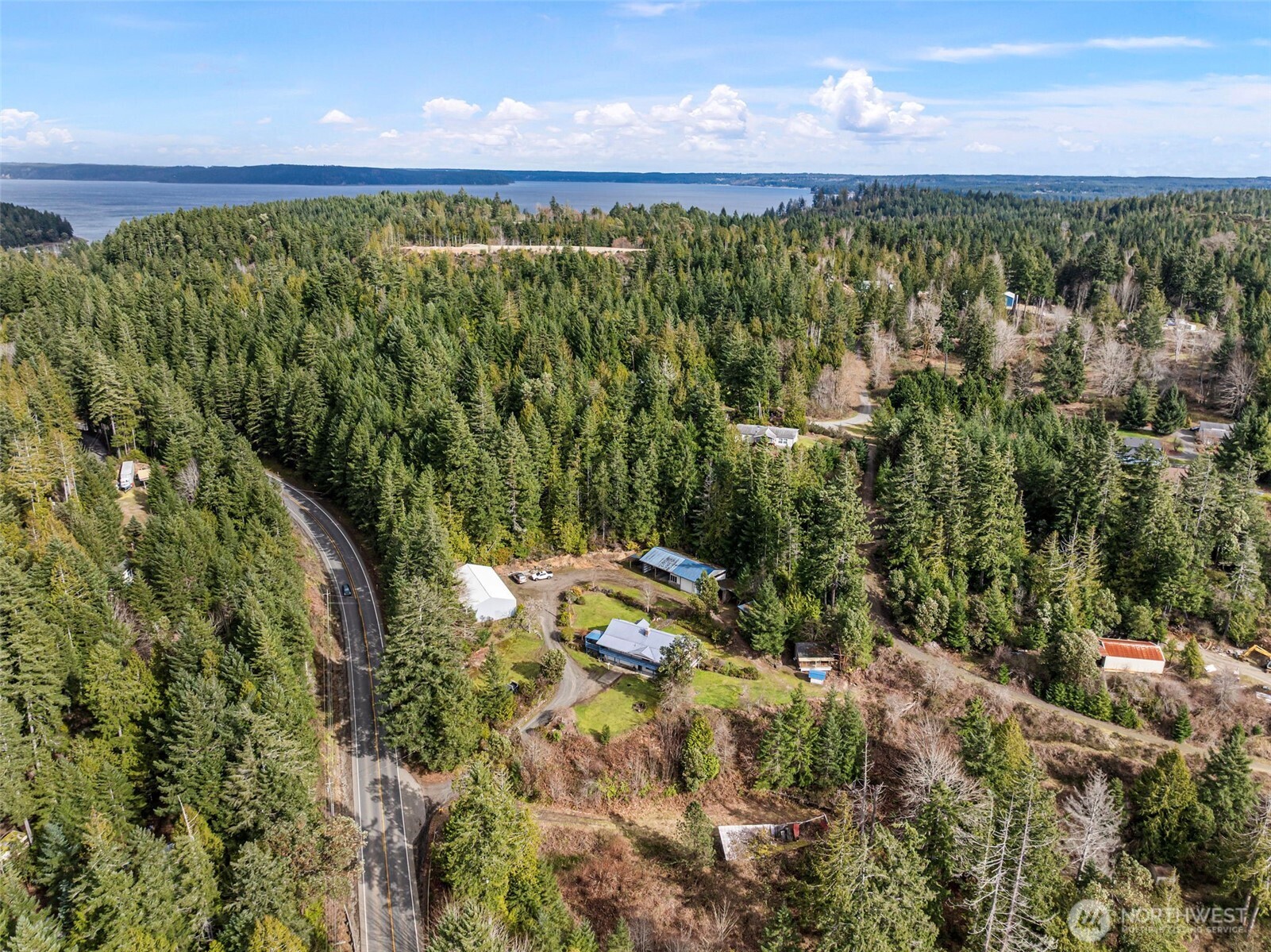 309723 Highway 101 Brinnon, WA 98320 - Photo 3 of 40 a view of a yard with an outdoor space
