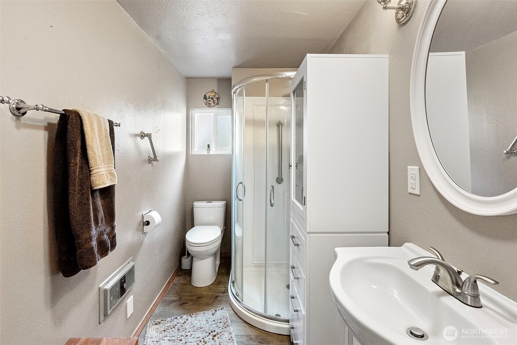 309723 Highway 101 Brinnon, WA 98320 - Photo 35 of 40 a bathroom with a sink toilet and shower