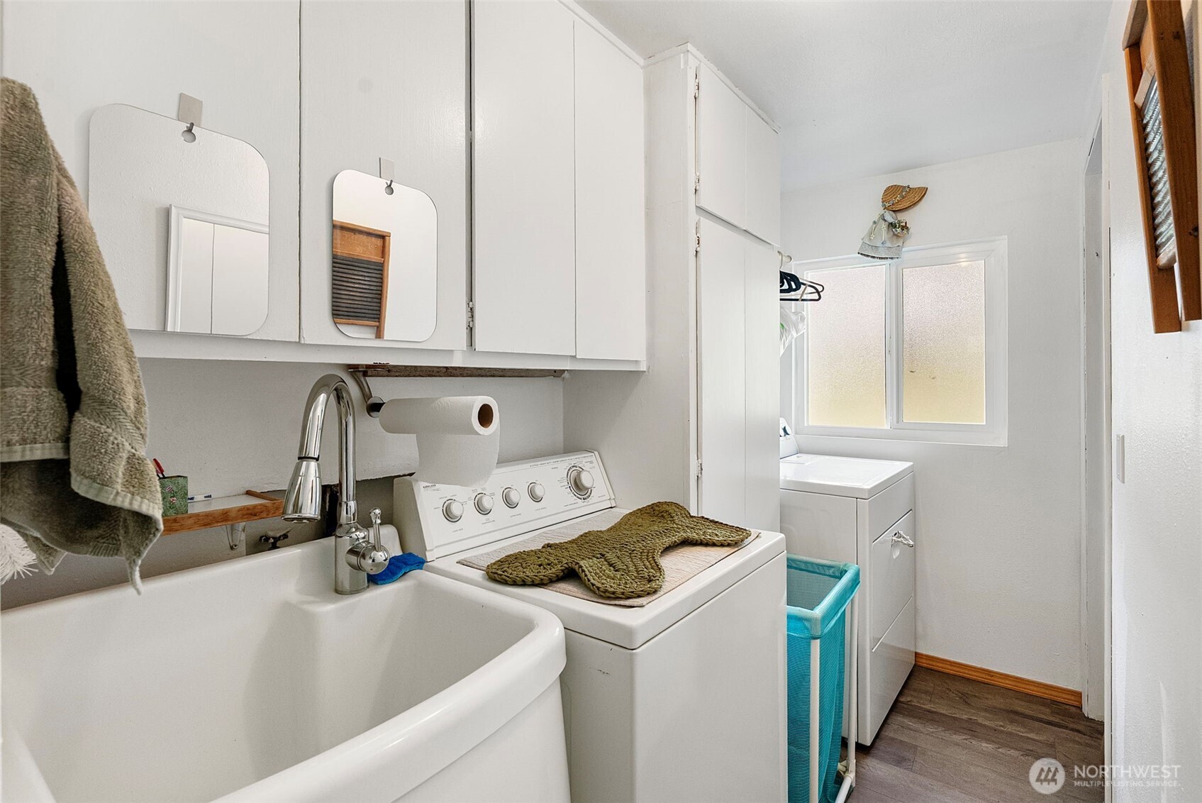 309723 Highway 101 Brinnon, WA 98320 - Photo 36 of 40 a view of a kitchen with sink and washing machine
