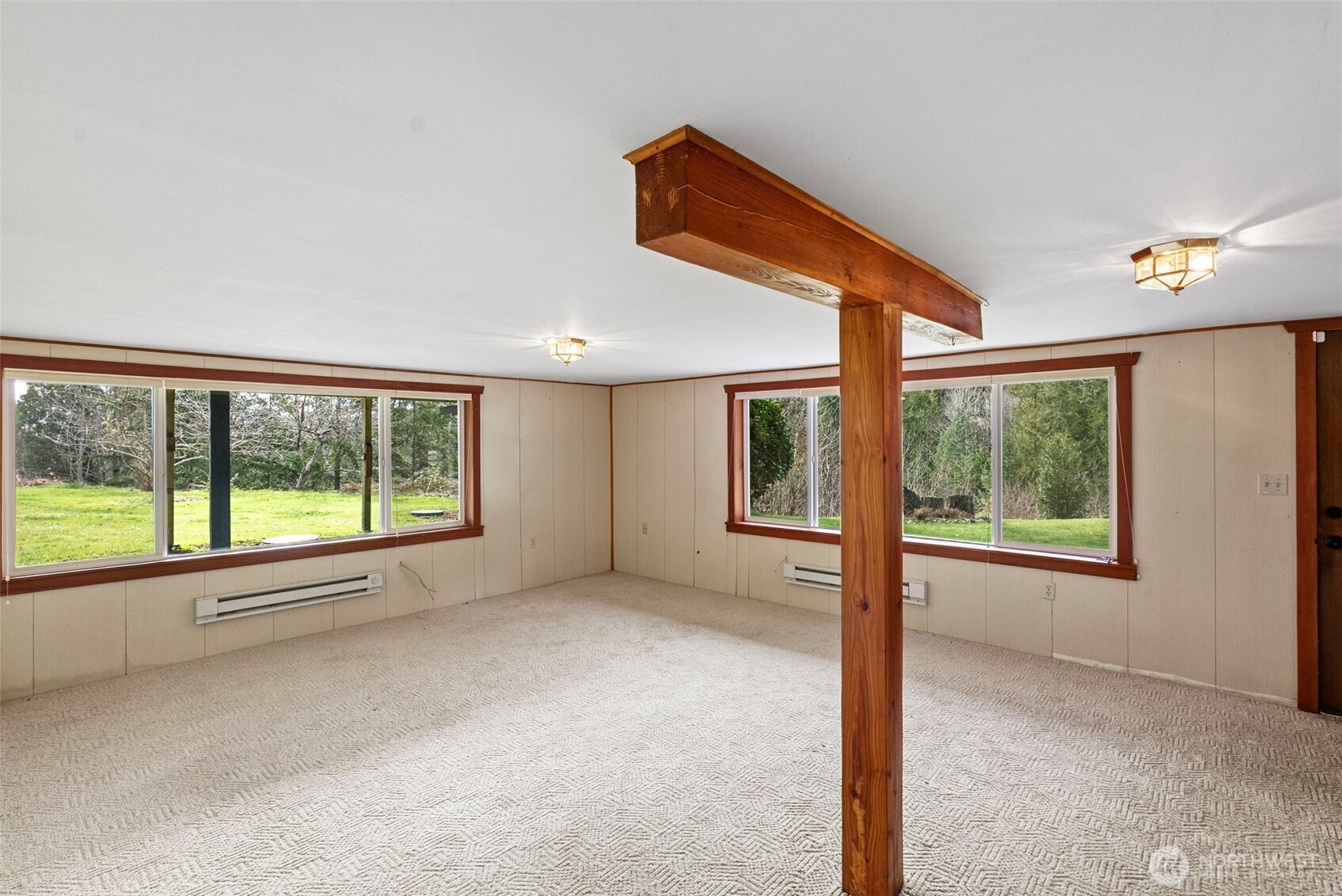 309723 Highway 101 Brinnon, WA 98320 - Photo 37 of 40 a view of an empty room with a window