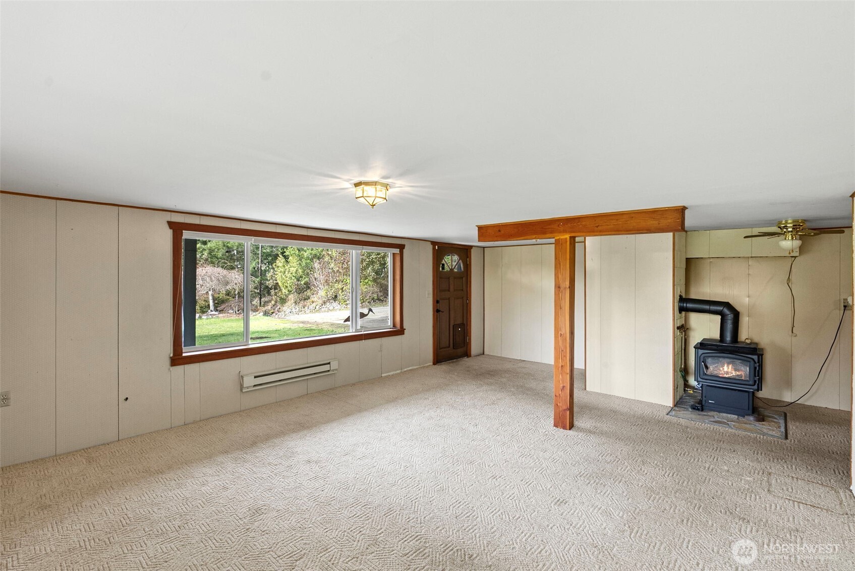 309723 Highway 101 Brinnon, WA 98320 - Photo 38 of 40 an empty room with windows and closet