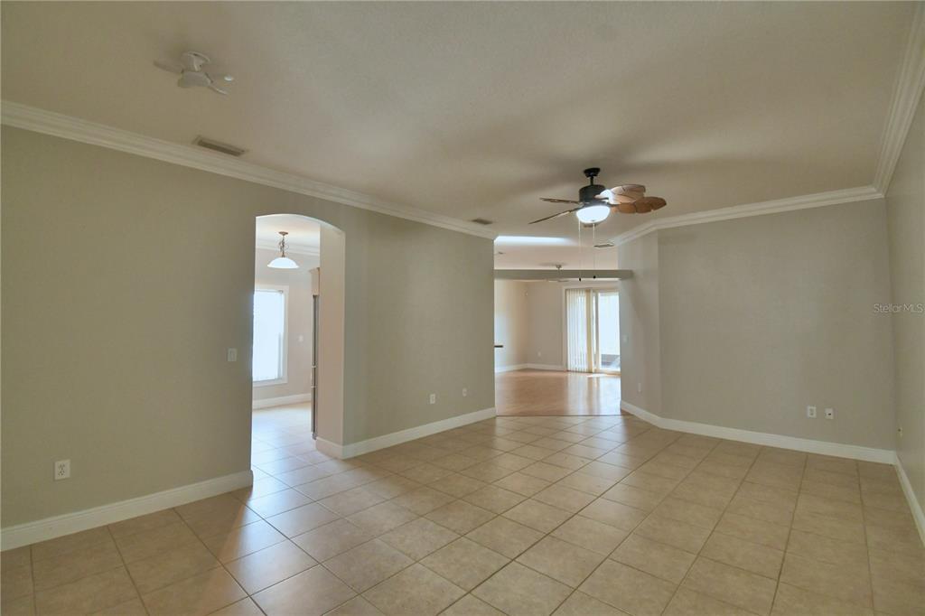 5610 Forest Ridge Drive Winter Haven, FL 33881 - Photo 12 of 70 wooden floor in an empty room with a window