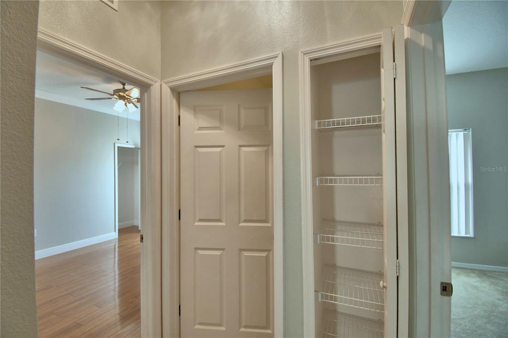 5610 Forest Ridge Drive Winter Haven, FL 33881 - Photo 22 of 70 a bathroom with a shower and a glass door