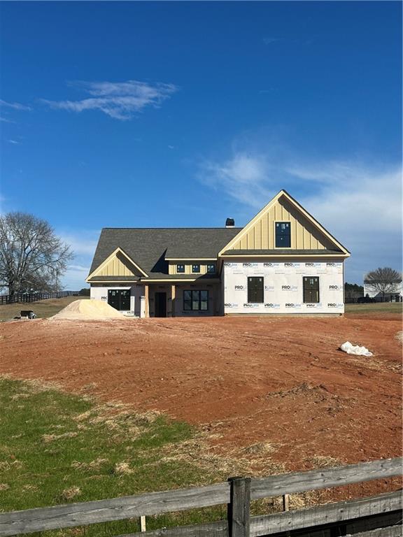a front view of a house with yard