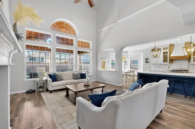 a living room with furniture and a table