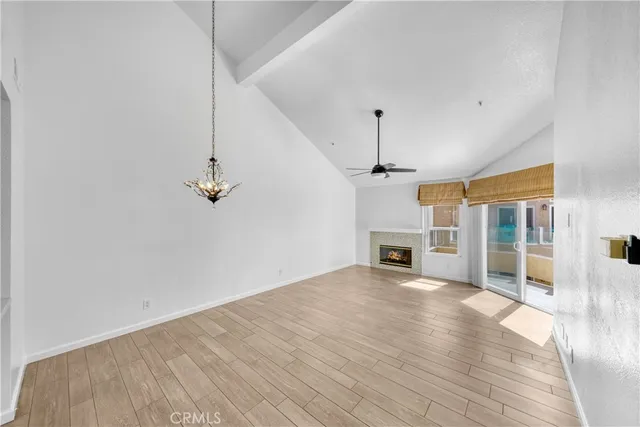 a kitchen with kitchen island a sink stove and refrigerator