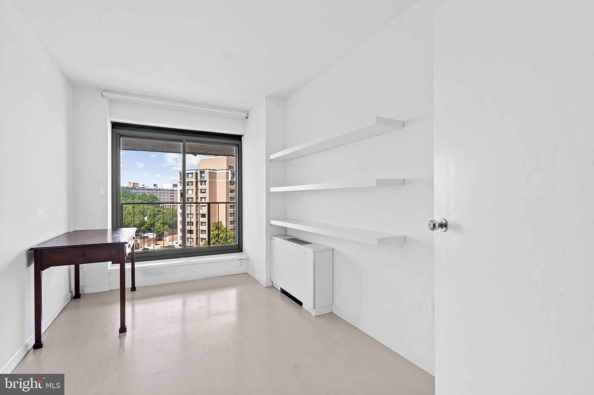 2510 Virginia Avenue Northwest, Unit 708N Washington, DC 20037 - Photo 13 of 37 a view of an empty room with a window