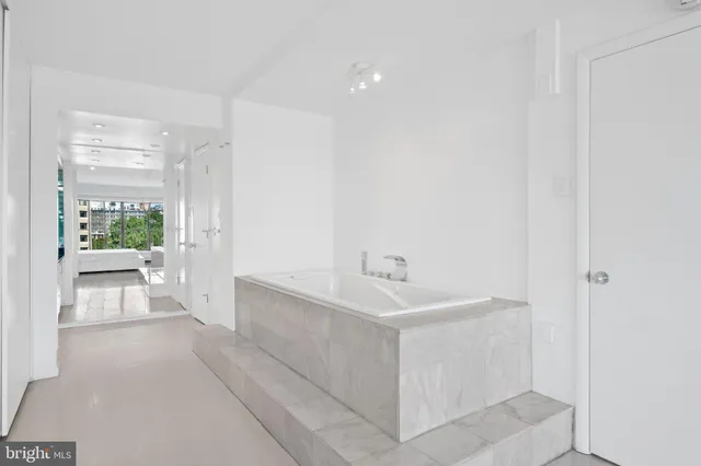 a view of bathroom with dual sinks