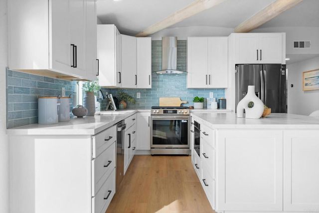 a view of roof deck with furniture