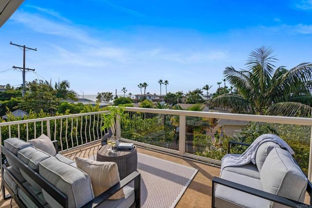 a view of a terrace with wooden floor