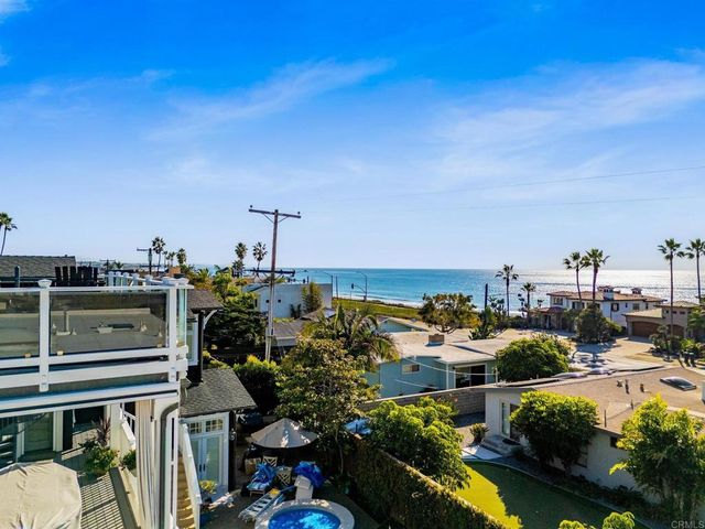a spacious bathroom with a bathtub and shower