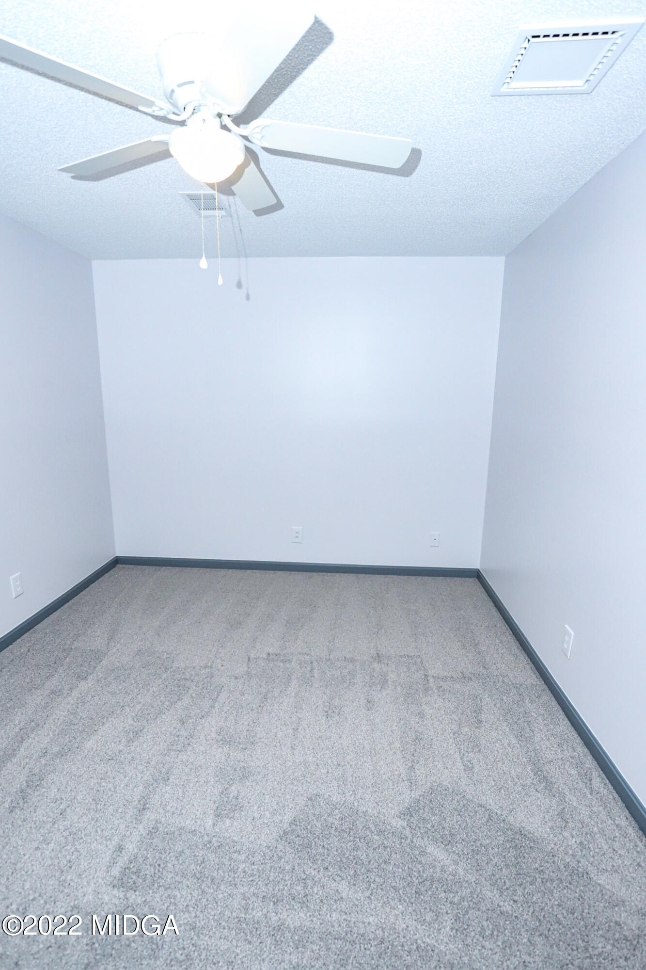 107 Ridge Circle Macon, GA 31216 - Photo 30 of 80 a view of a room with a ceiling fan and window