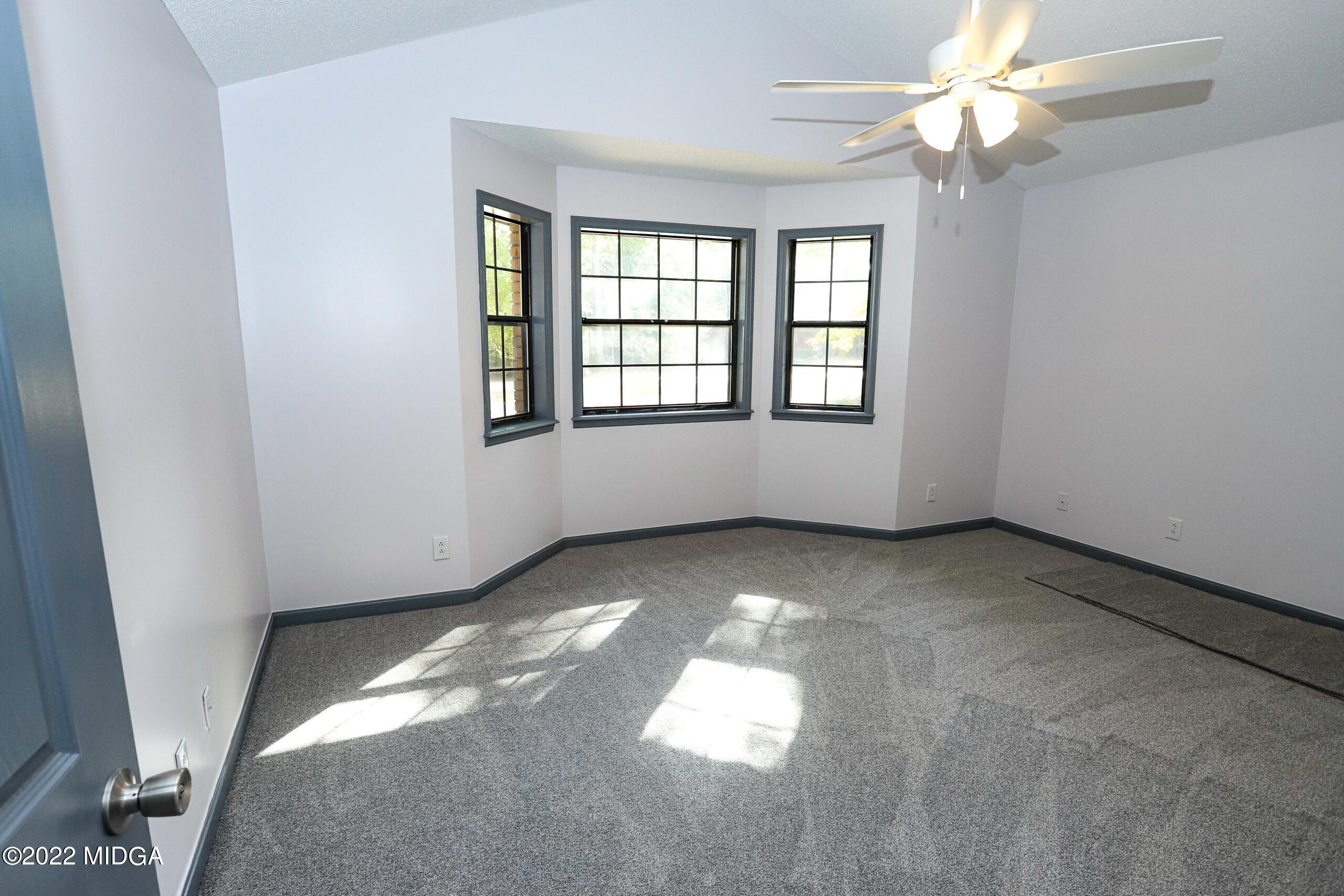 107 Ridge Circle Macon, GA 31216 - Photo 64 of 80 an empty room with windows and entrance