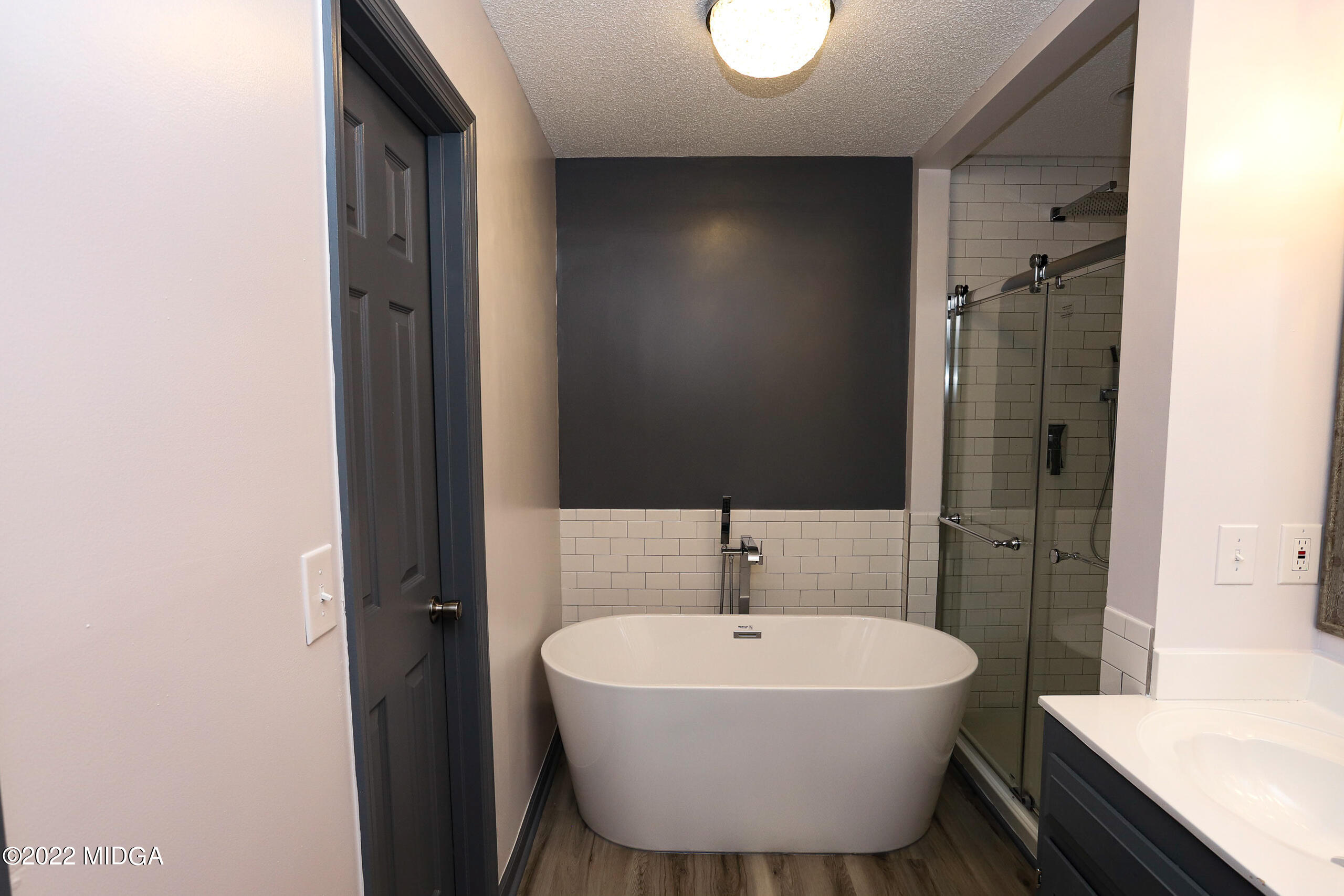 107 Ridge Circle Macon, GA 31216 - Photo 71 of 80 a bathroom with a sink and a bathtub